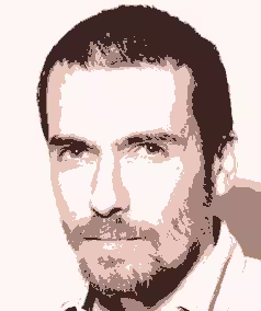 Portrait of Lionel Péramo in close-up with a stylized digital filter effect on a dark background